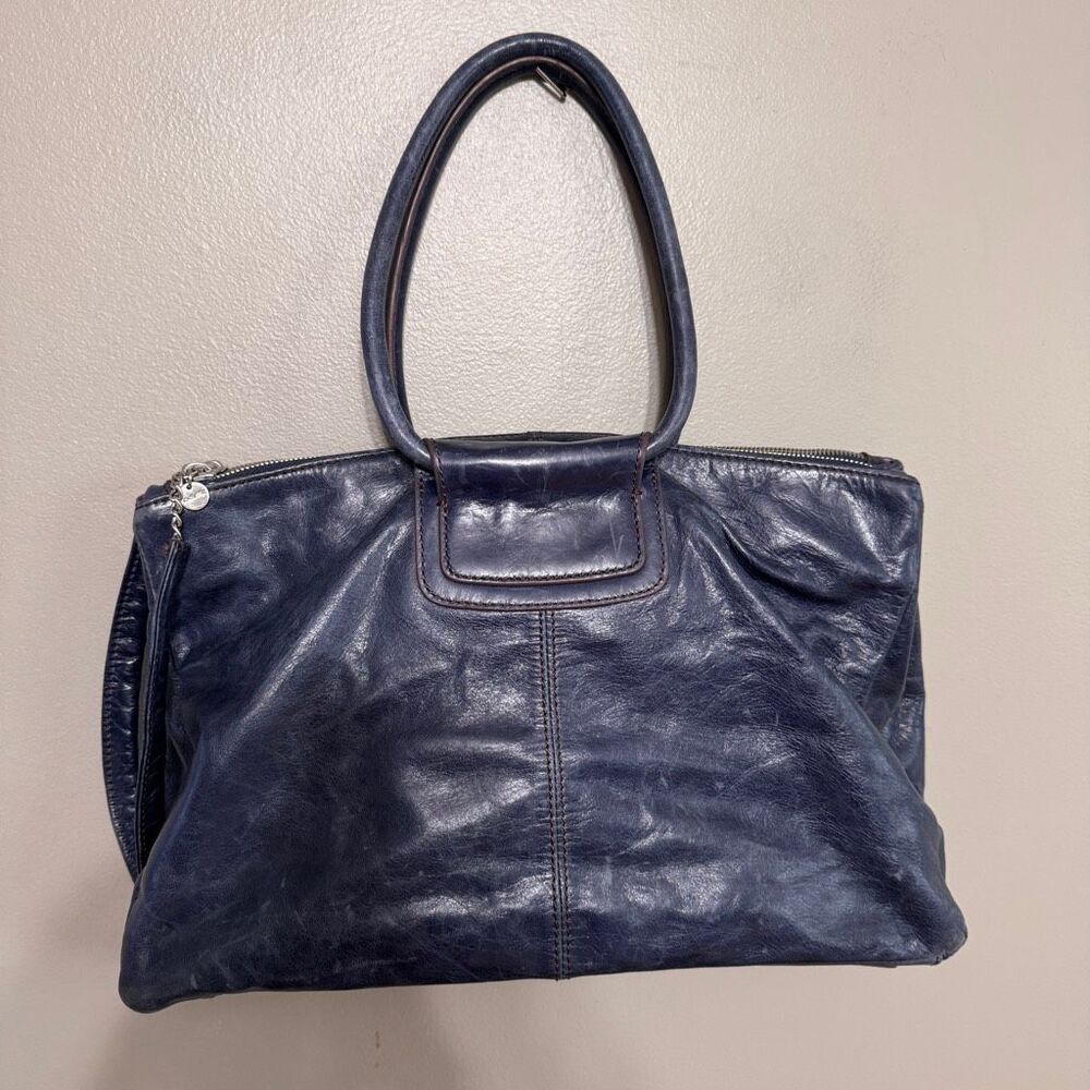 HOBO Medium Sheila Satchel crafted from a rich blue washed leather